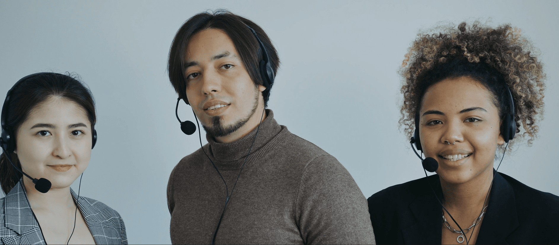 Customer support team wearing headsets
